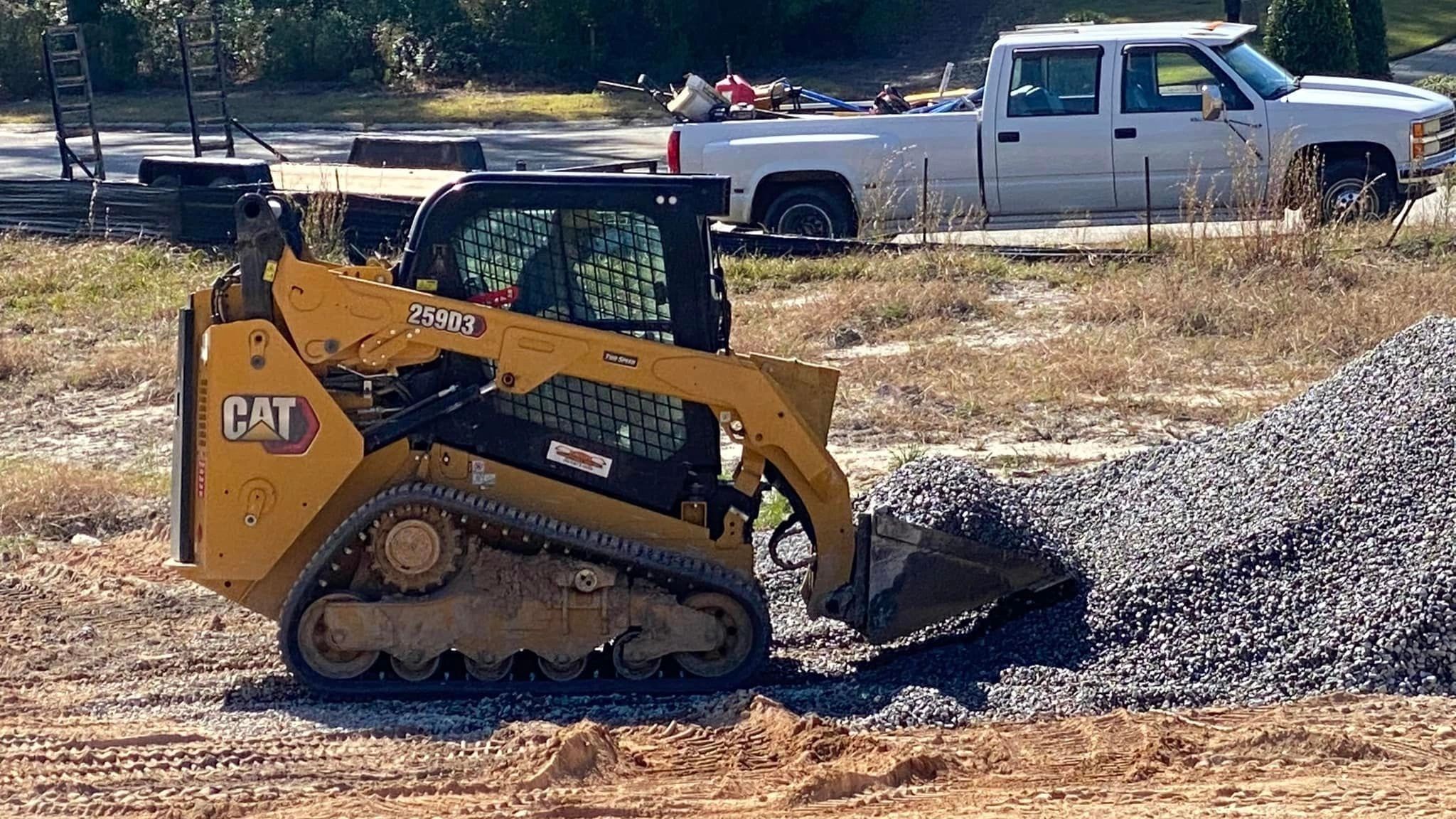 CAT 259D3 skid steer loader on job site